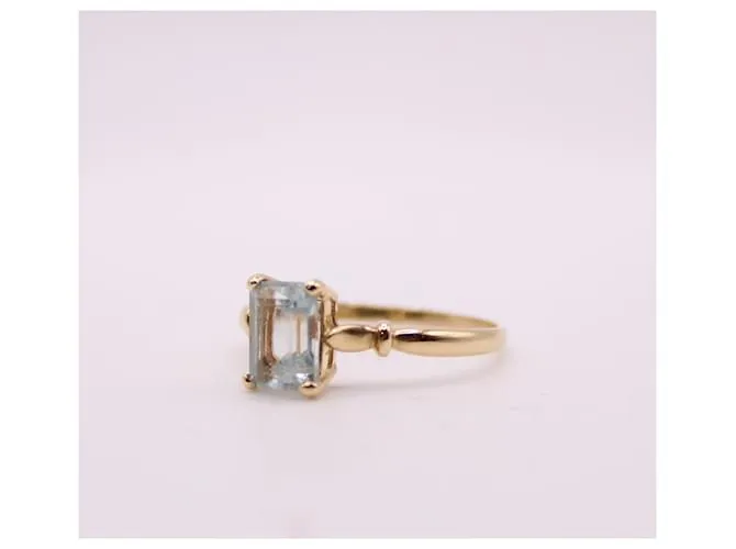 Autre Marque Anillo engastado con una aguamarina en oro amarillo 750%O Azul claro Gold hardware 