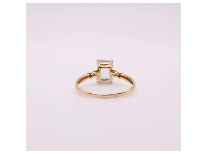 Autre Marque Anillo engastado con una aguamarina en oro amarillo 750%O Azul claro Gold hardware 