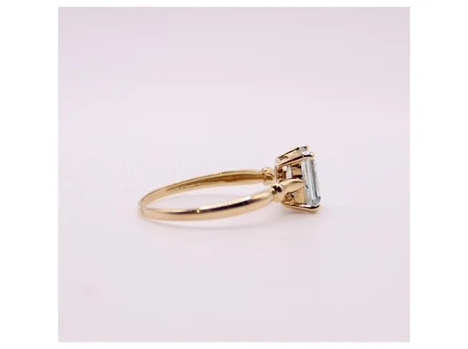 Autre Marque Anillo engastado con una aguamarina en oro amarillo 750%O Azul claro Gold hardware 