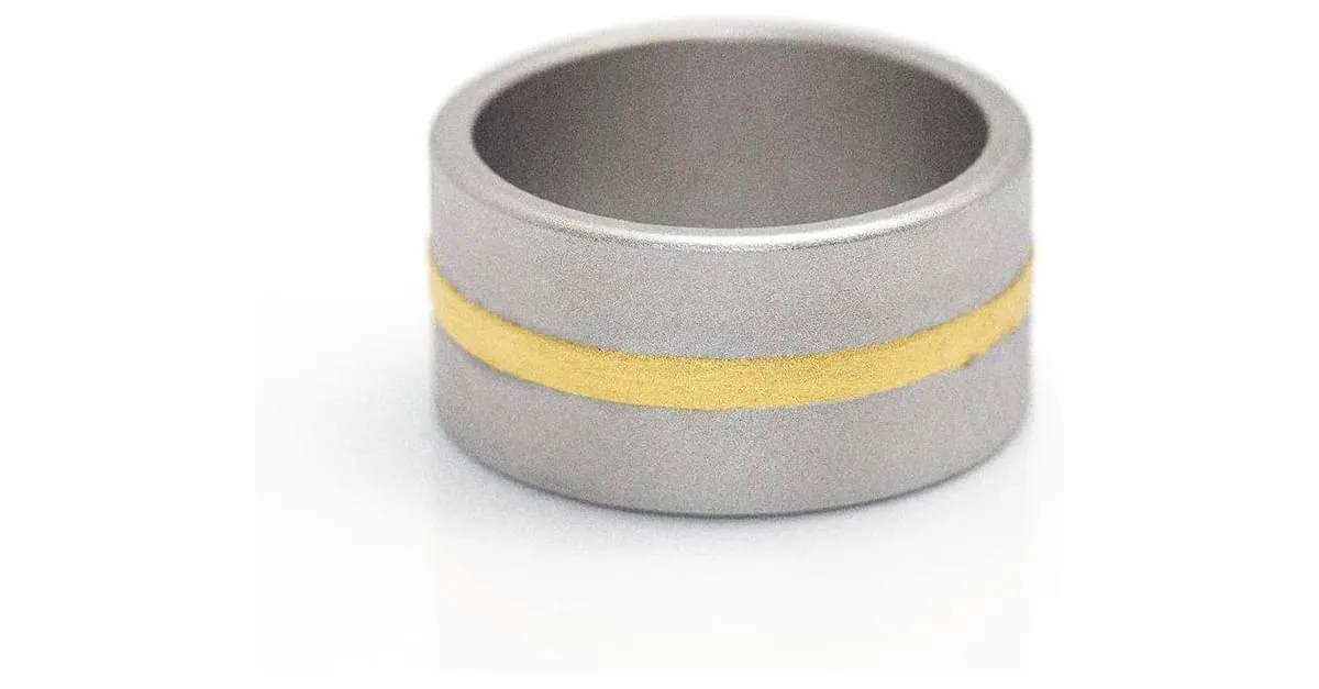 Autre Marque Anillo NIESSING FUSION en Oro Amarillo y Acero. Dorado 