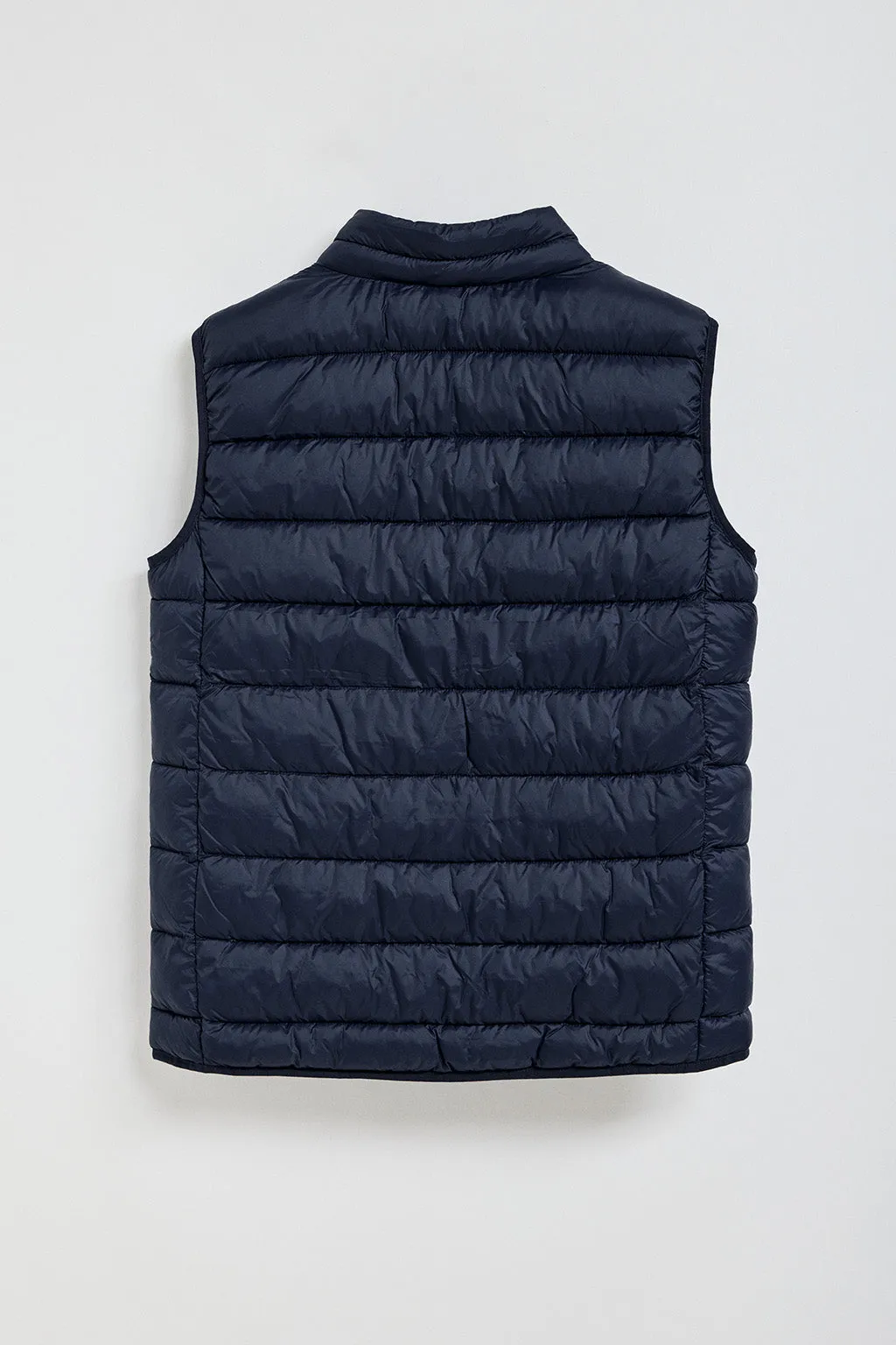 Chaleco Chase ultralight azul marino con parche Rigby Go