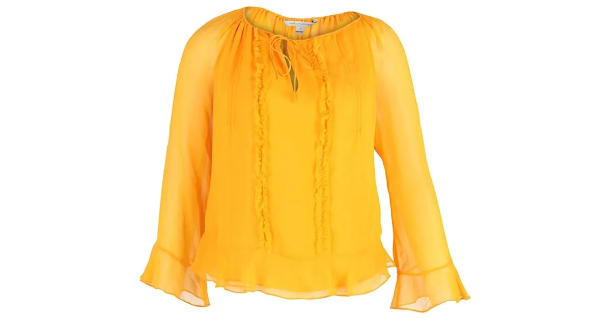 Diane Von Furstenberg Top con mangas transparentes y volantes en seda amarilla Amarillo 
