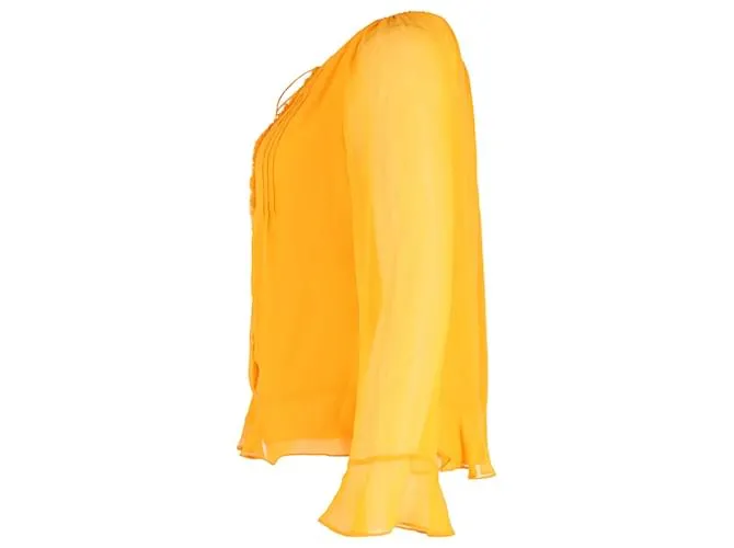 Diane Von Furstenberg Top con mangas transparentes y volantes en seda amarilla Amarillo 
