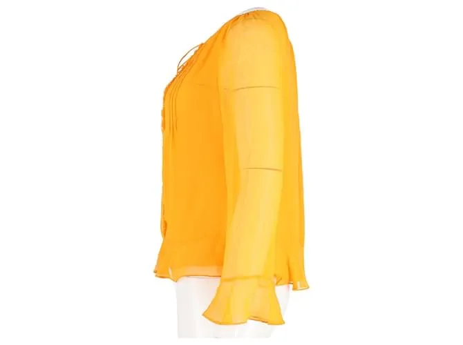 Diane Von Furstenberg Top con mangas transparentes y volantes en seda amarilla Amarillo 