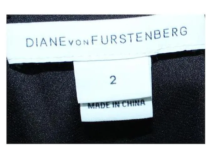 Diane Von Furstenberg Vestido Olesia de seda estampado negro y amarillo 
