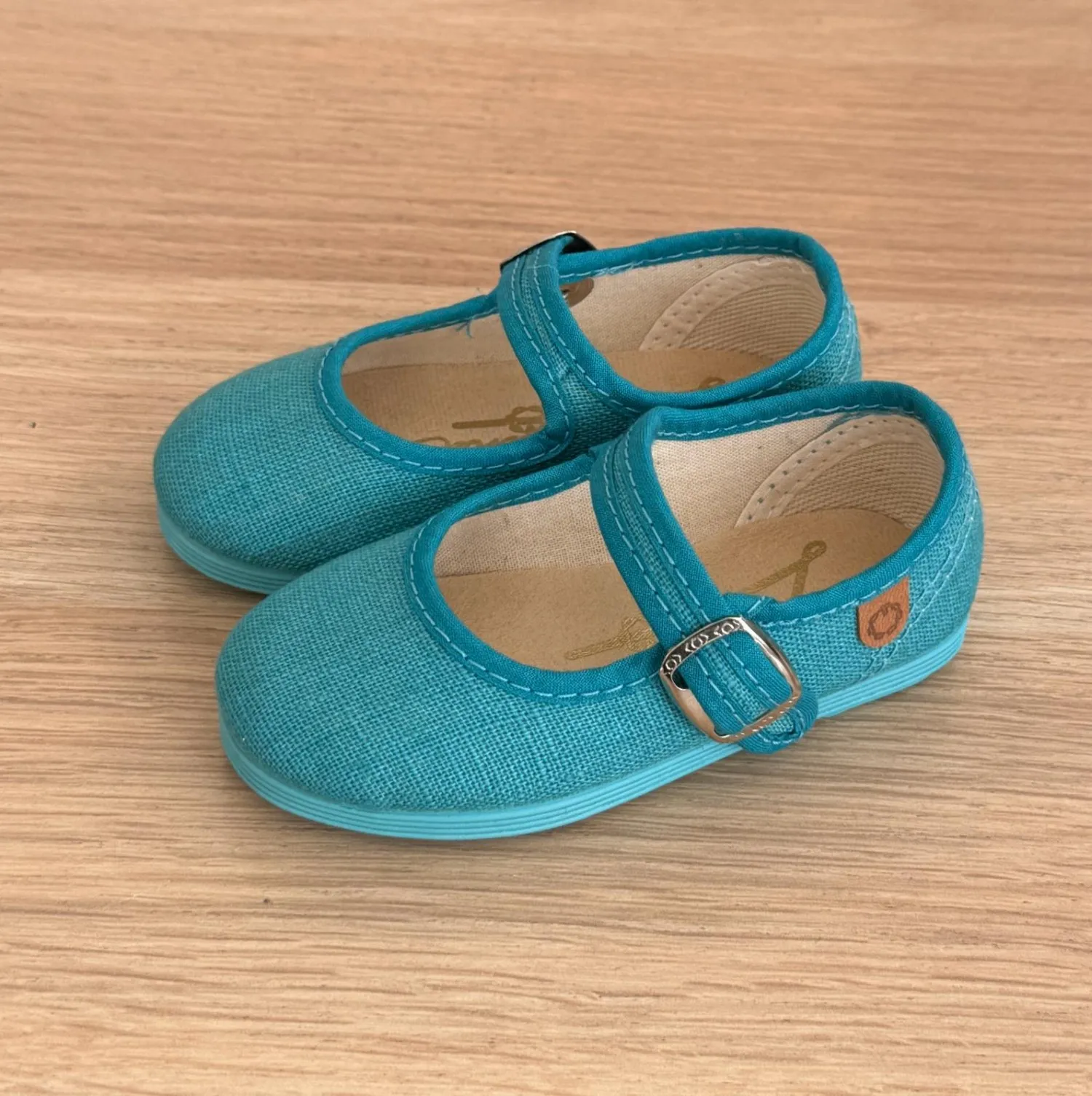 Linen Mary Janes in various colors.