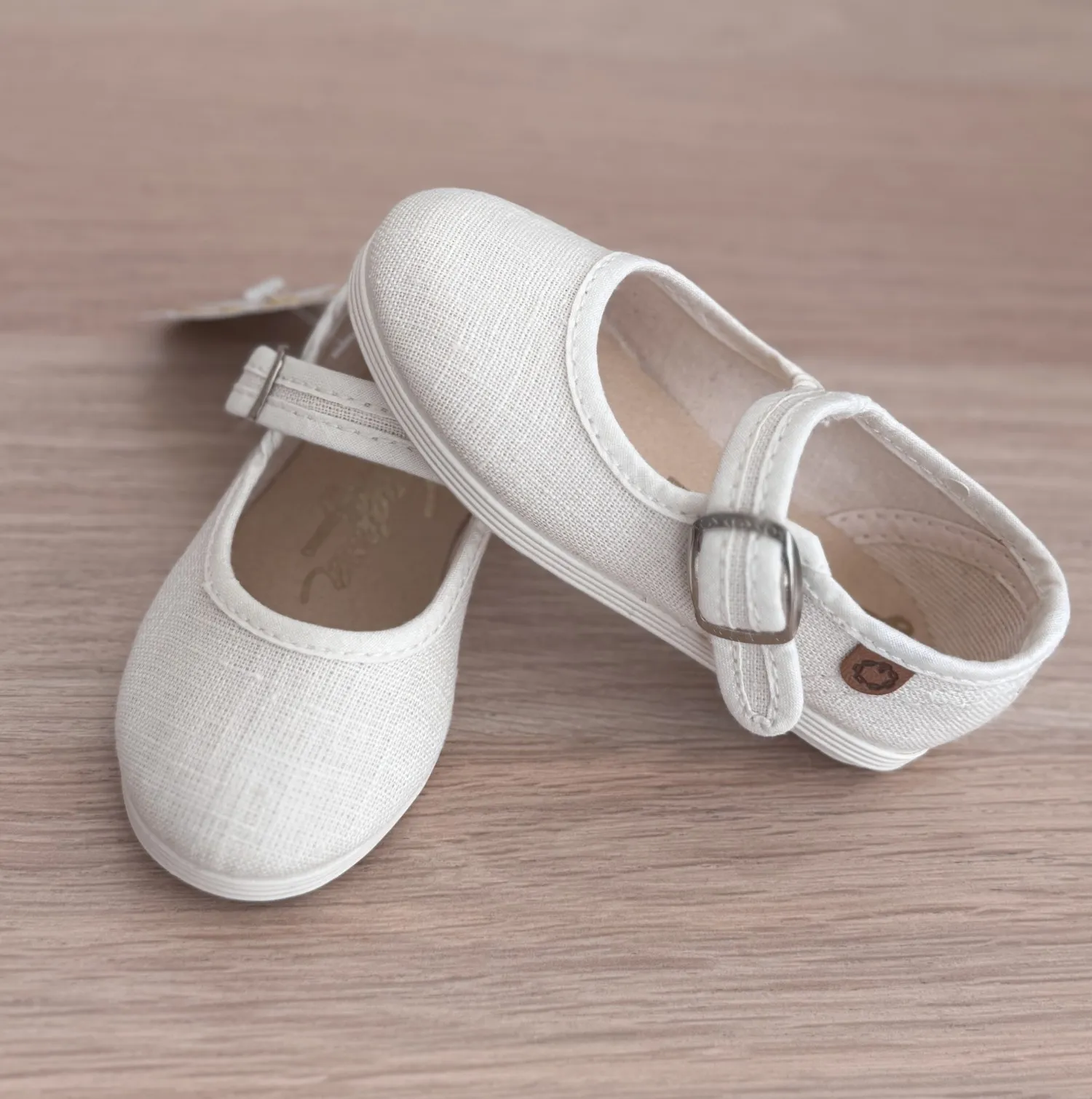 Linen Mary Janes in various colors.
