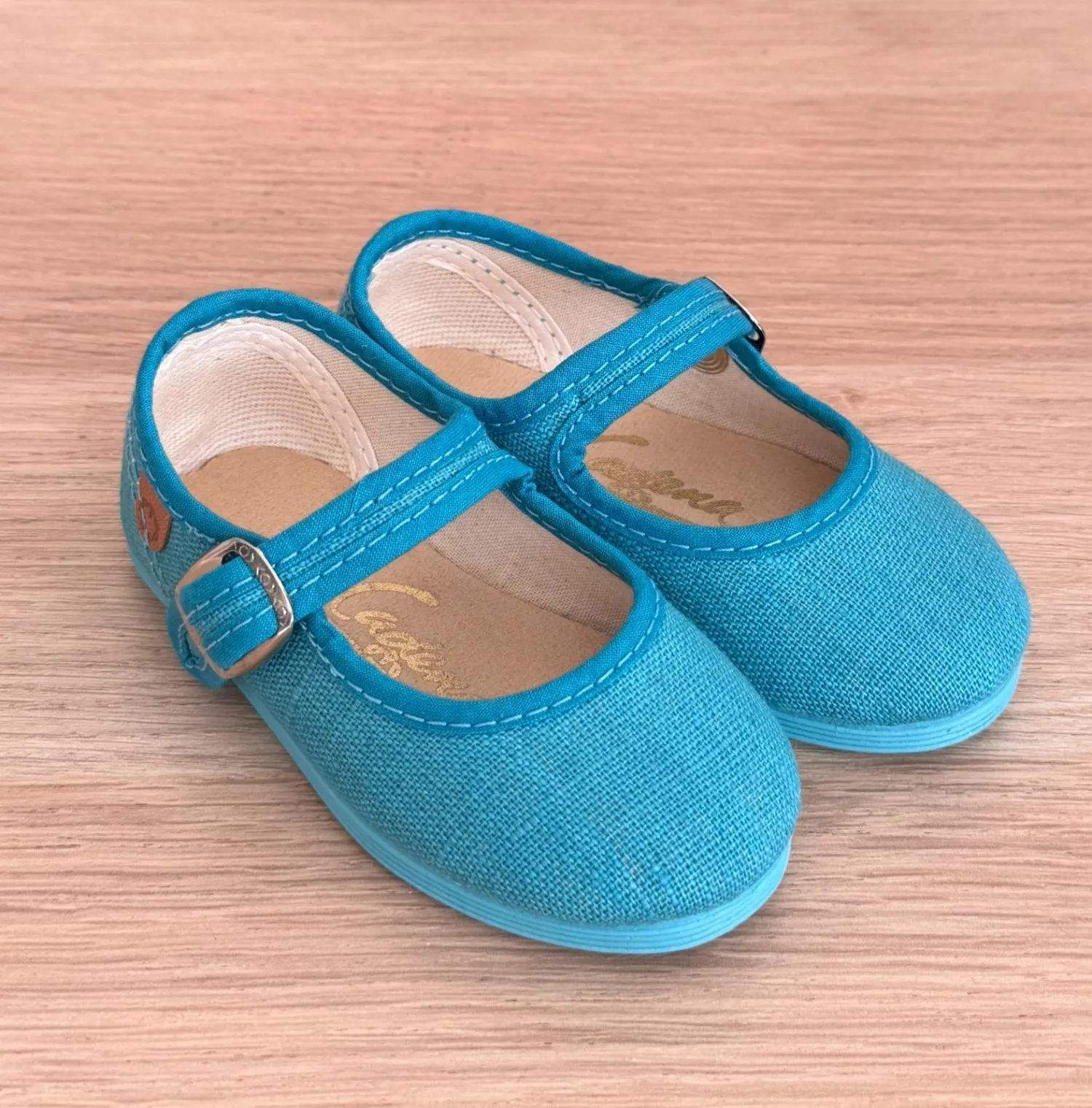 Linen Mary Janes in various colors.