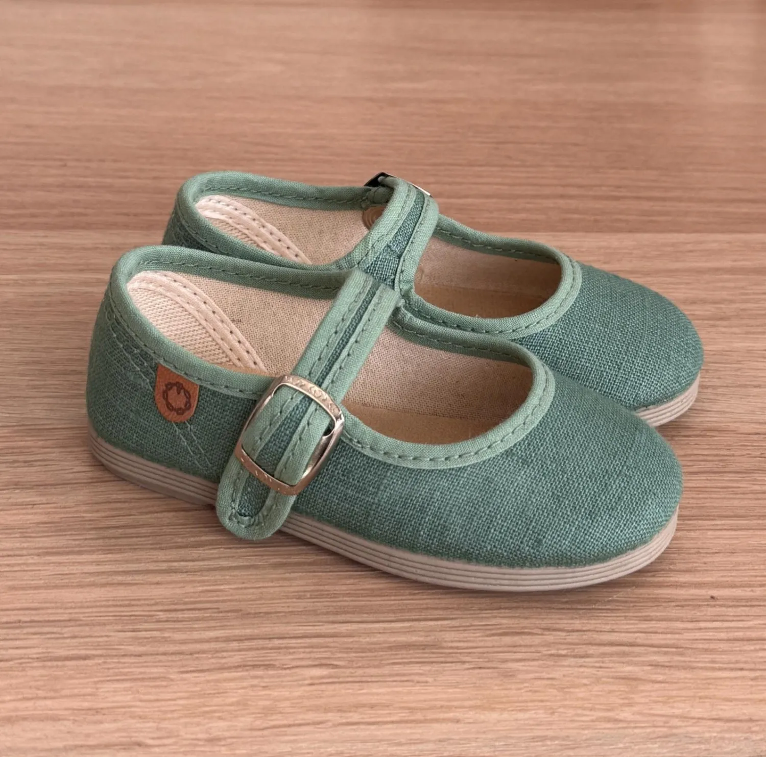 Linen Mary Janes in various colors.