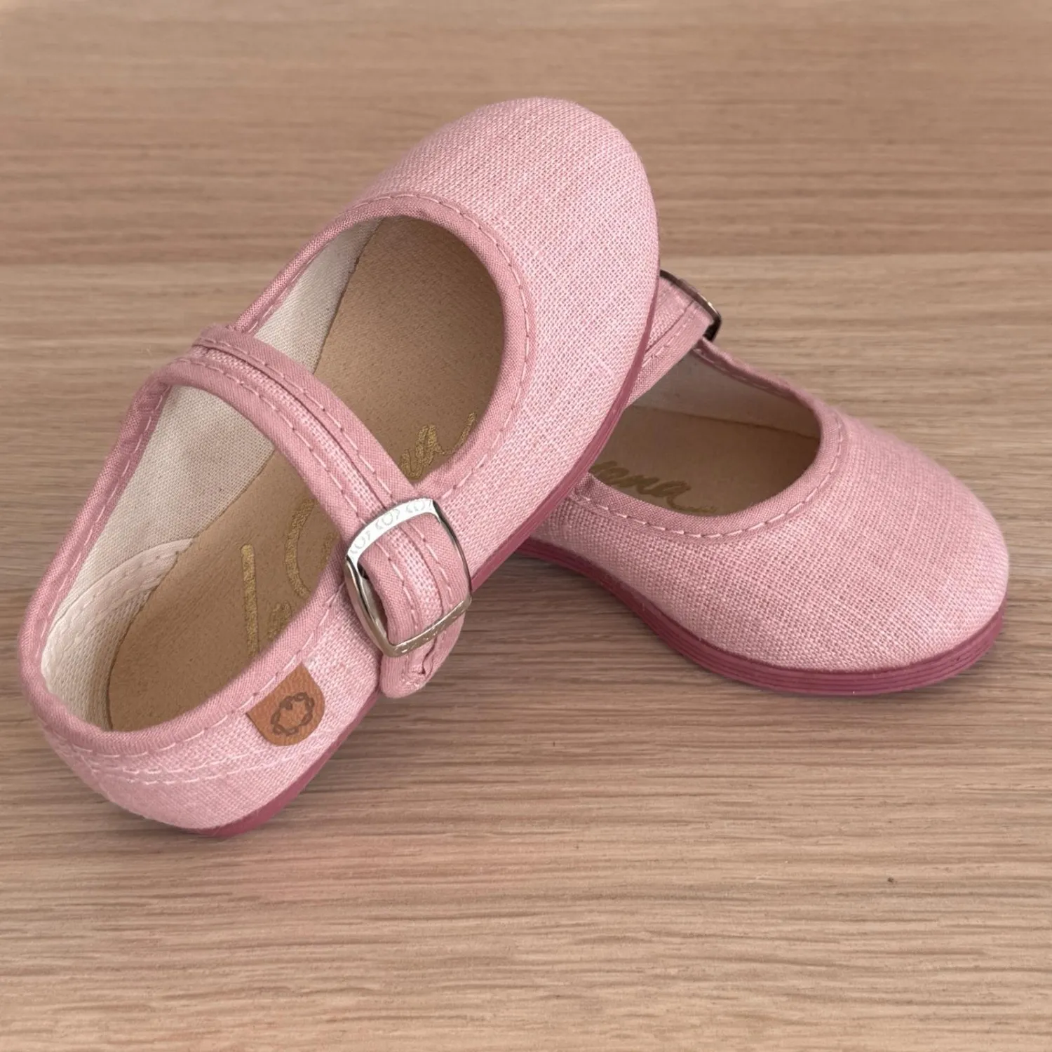 Linen Mary Janes in various colors.