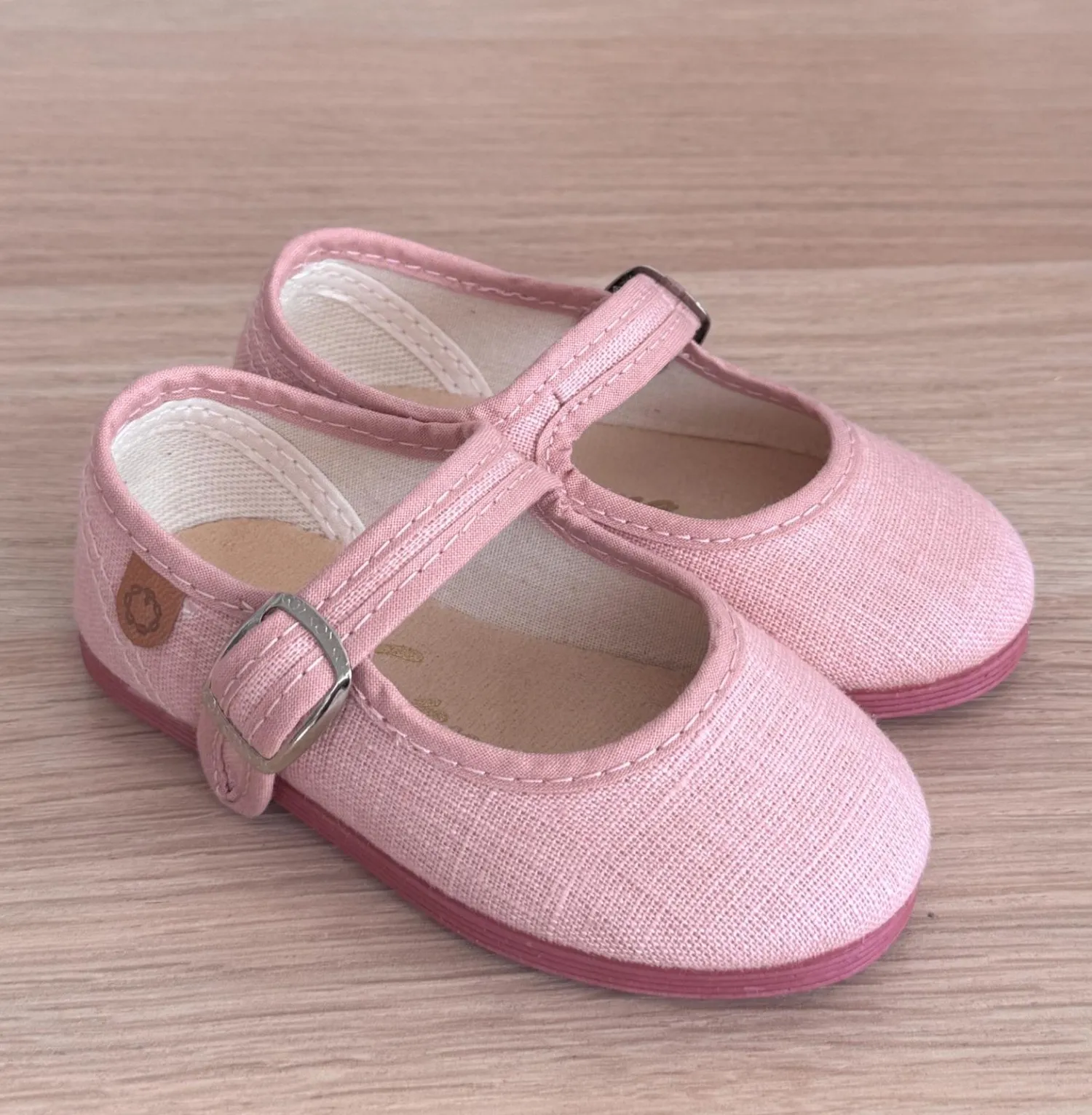 Linen Mary Janes in various colors.