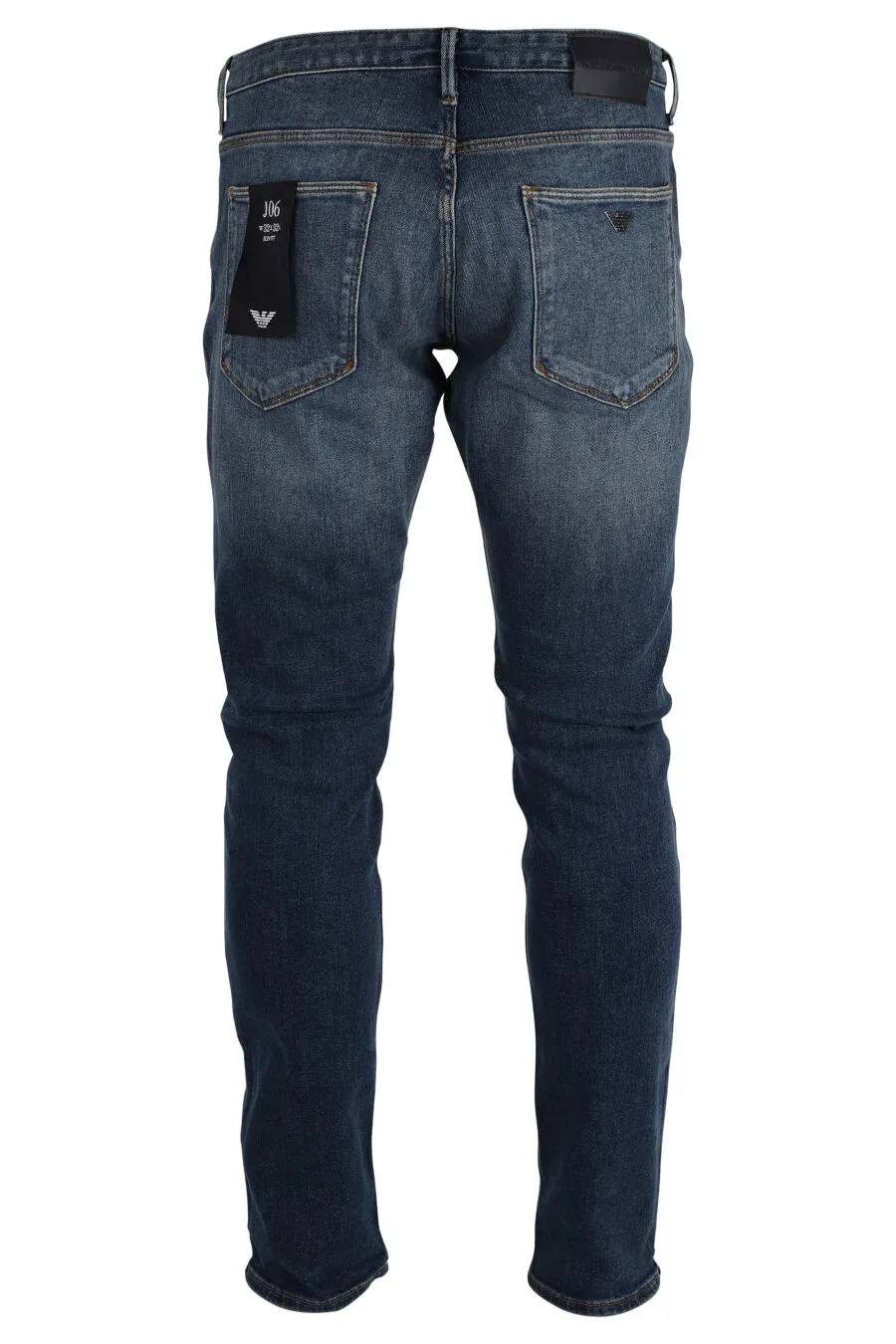 Pantalón vaquero azul con logo águila metal