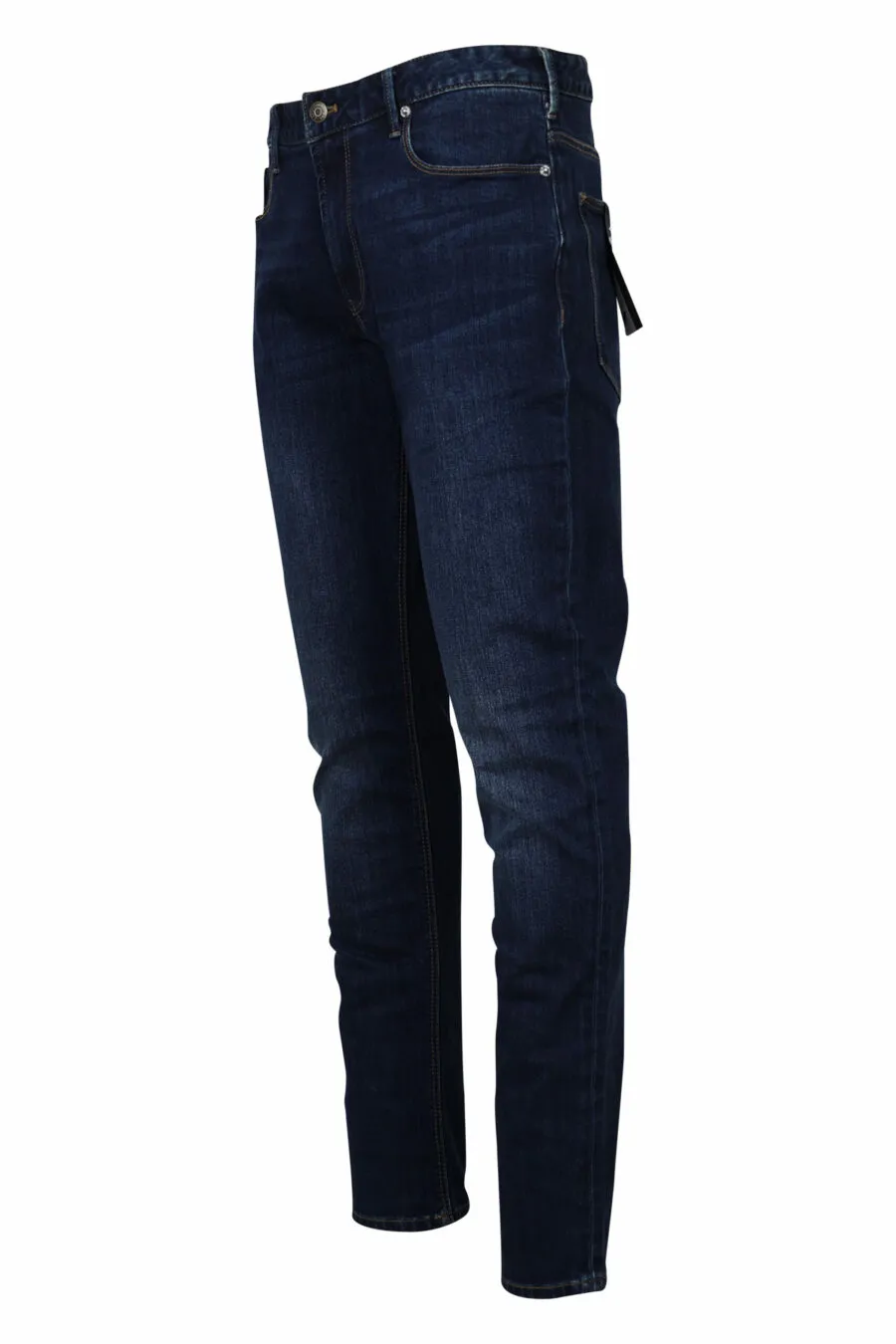 Pantalón vaquero azul oscuro con logo águila de metal