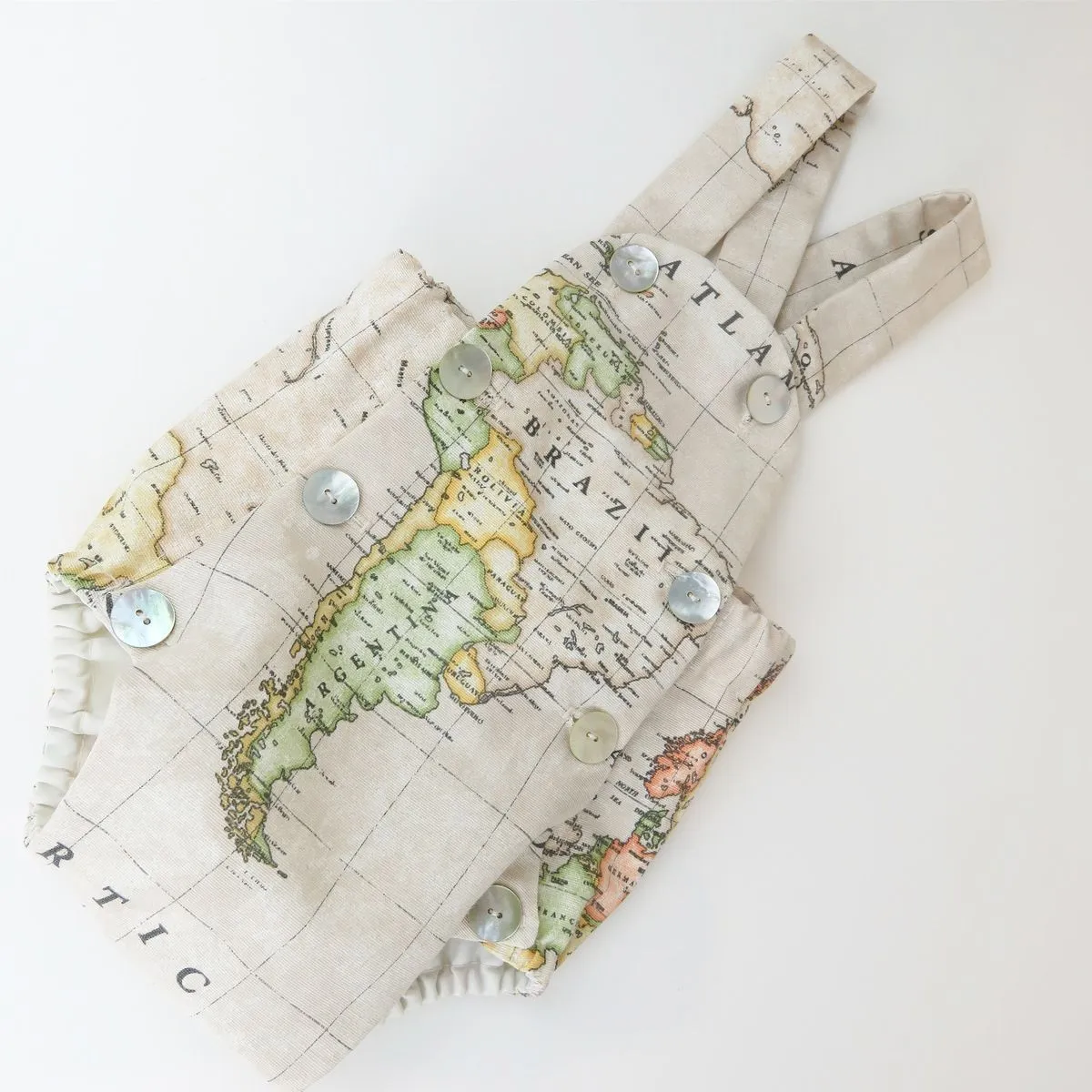 Ranita – Pelele mapa mundi beige