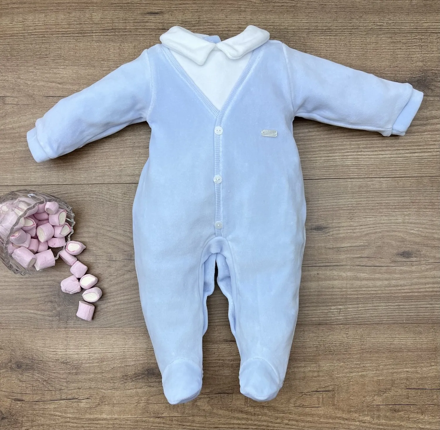 Sheer romper in blue with white.