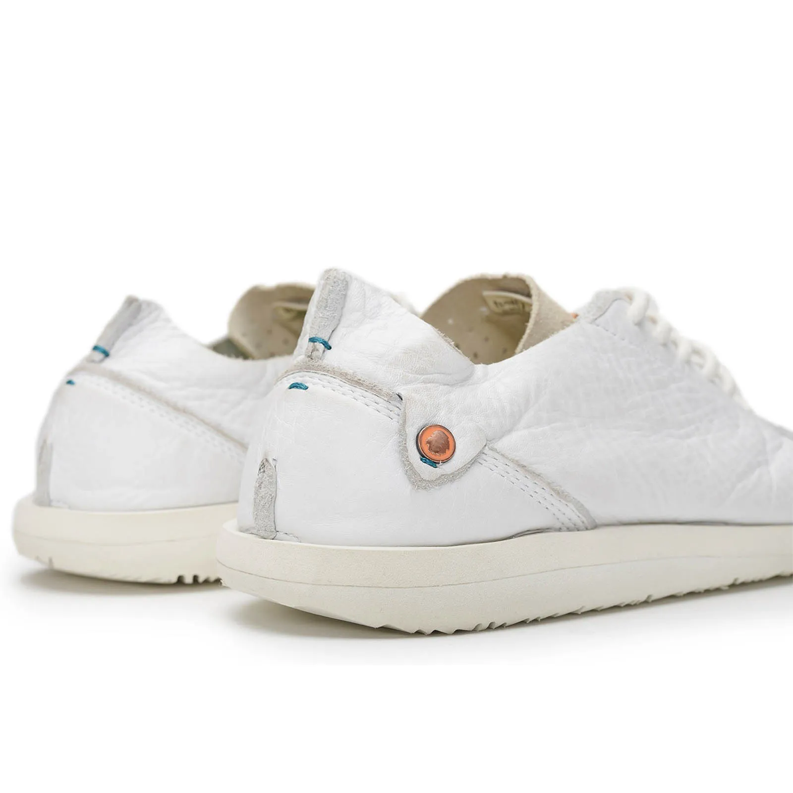 Tate Vaquero White